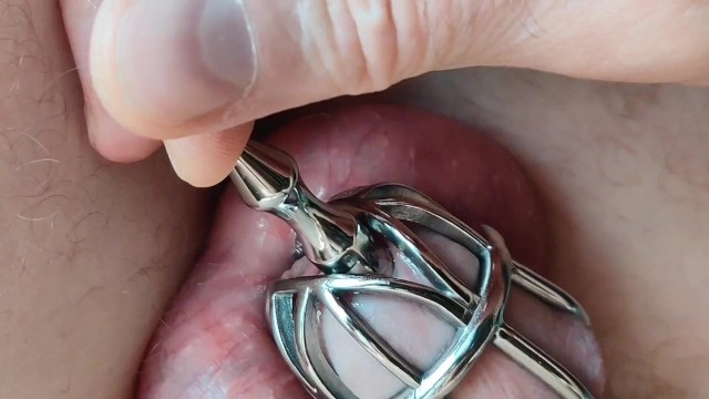 Chastity, urethral fuck close up and slow motion cumshot