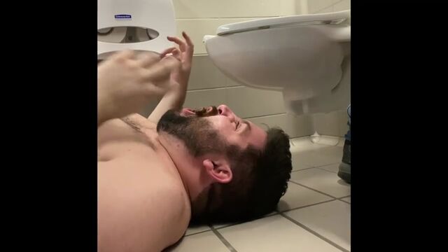 BEING FED IN A PUBLIC TOILET